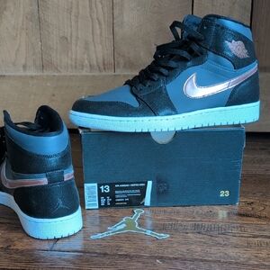 Air Jordan High-Top Sneakers in Black and Blue